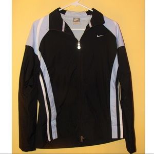 WOMENS Nike zipper up windbreaker.
